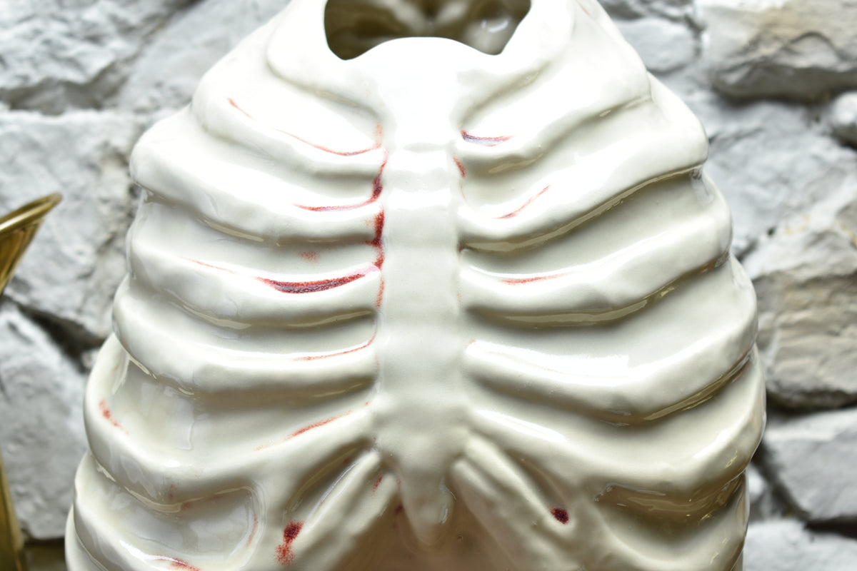 Handmade ribcage vase shiny white and bloody effect glaze