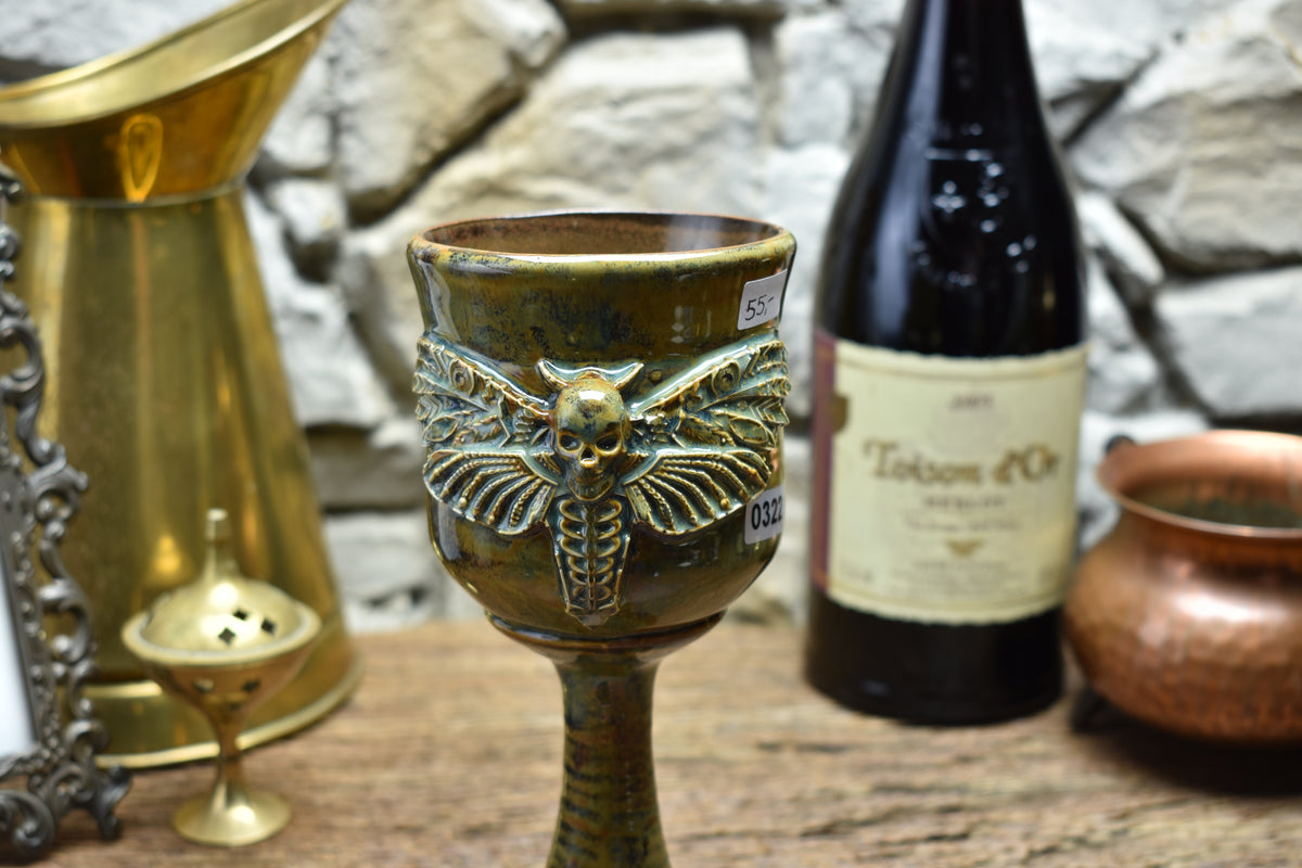 Handmade ceramic wine goblet with deathmoth - brown/green effect glaze