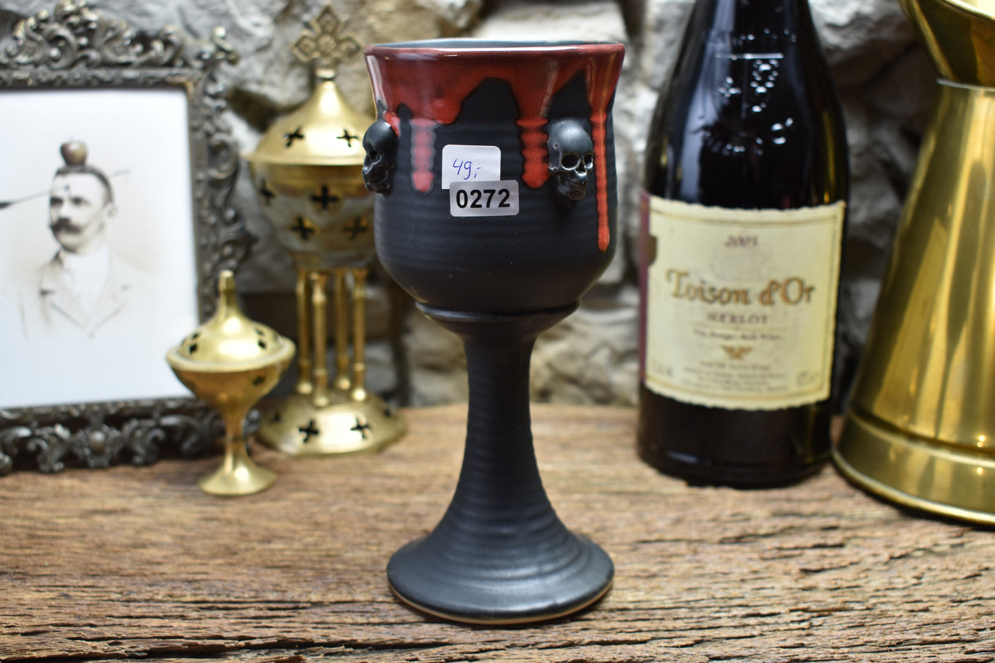 Handmade ceramic wine goblet with skulls - matt black & red