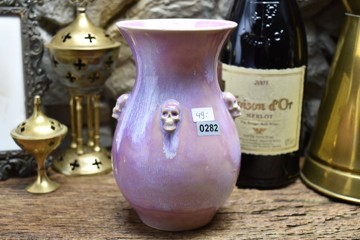 Handmade small vase with skulls lilac effect glaze