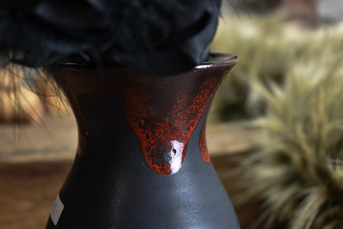 Handmade small vase black matt and red effect