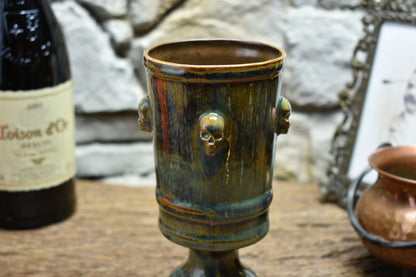 Handmade ceramic chalice with skulls - brown/green/blue effect glaze