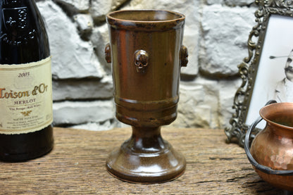 Handmade ceramic chalice with skulls - brown