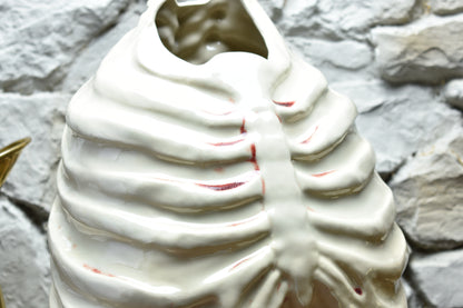Handmade ribcage vase shiny white and bloody effect glaze