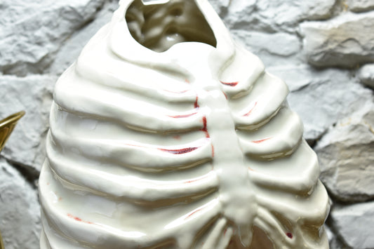 Handmade ribcage vase shiny white and bloody effect glaze