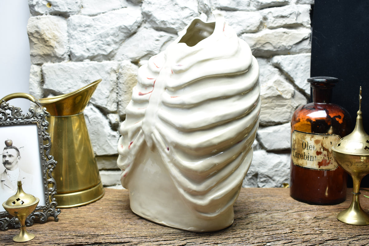 Handmade ribcage vase shiny white and bloody effect glaze