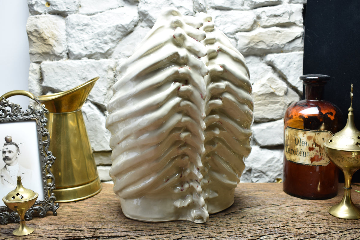 Handmade ribcage vase shiny white and bloody effect glaze