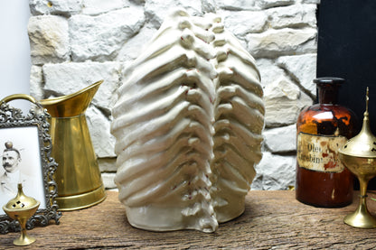 Handmade ribcage vase shiny white and bloody effect glaze