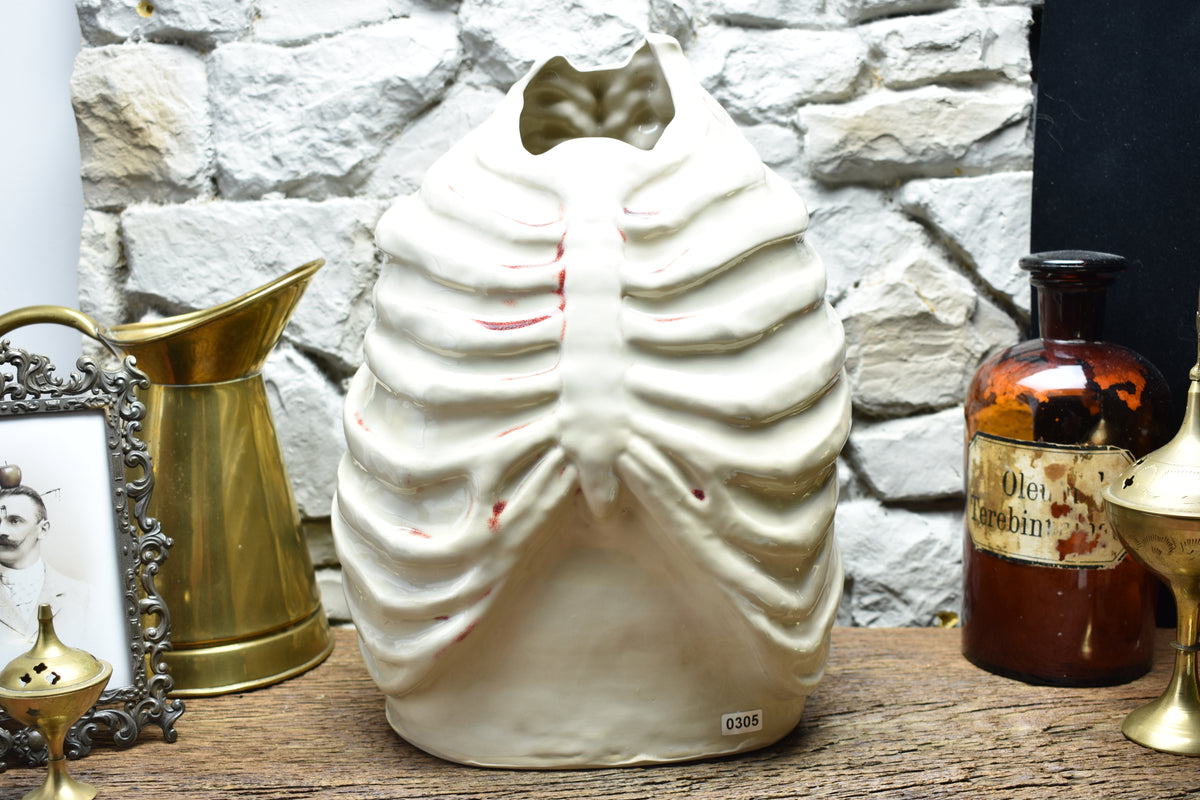 Handmade ribcage vase shiny white and bloody effect glaze