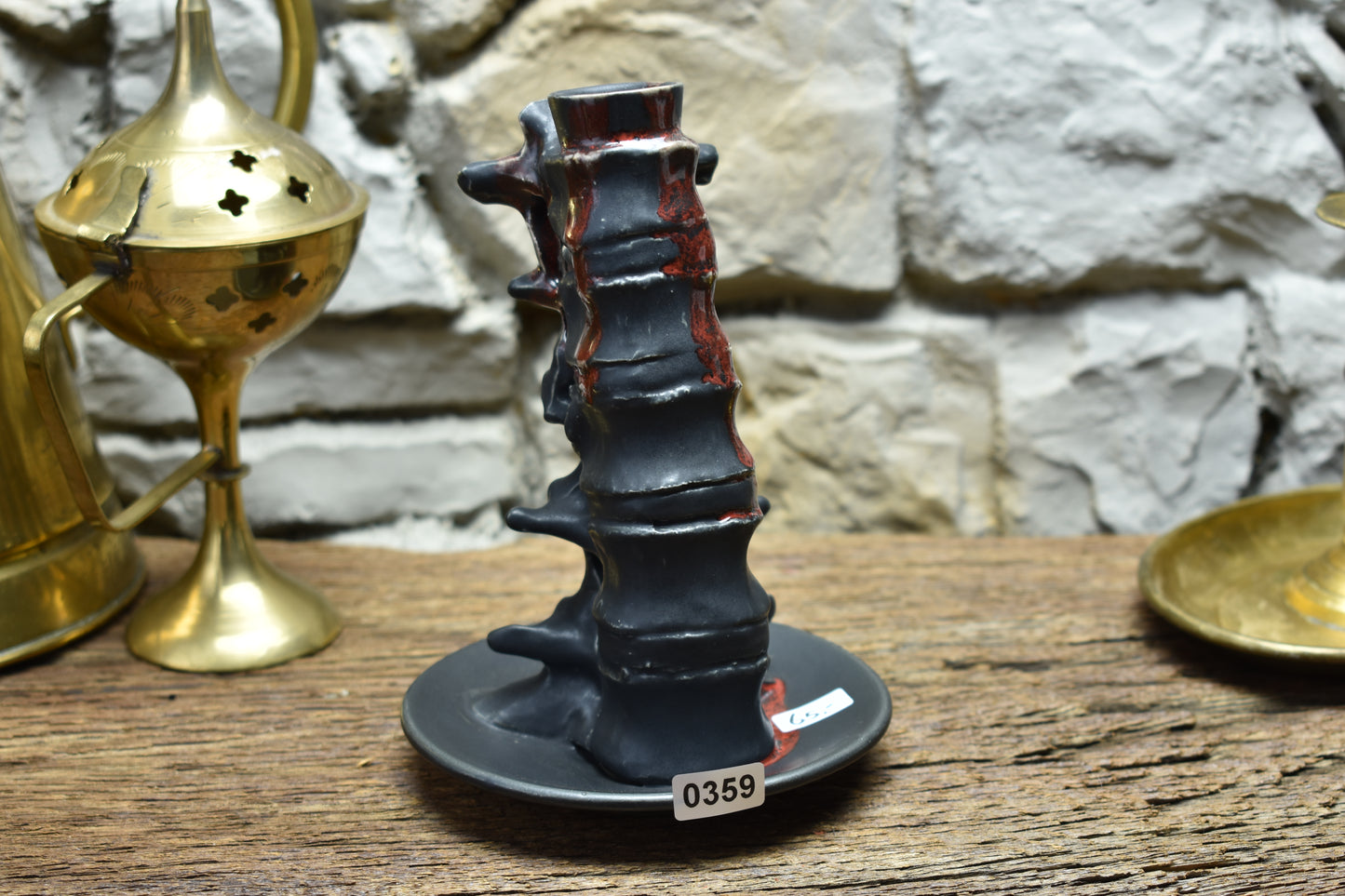 Spine candle holder medium black/red effect glaze