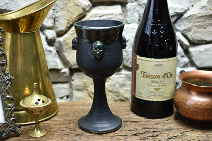 Handmade ceramic wine goblet with skulls - black/shinyblack effect