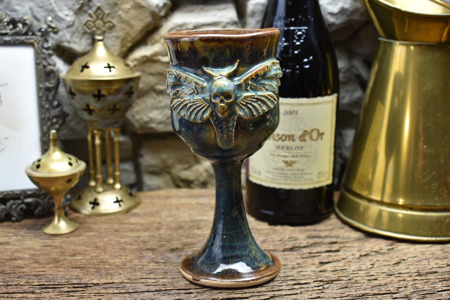 Handmade ceramic wine goblet with deathmoth - blue/brown effect glaze