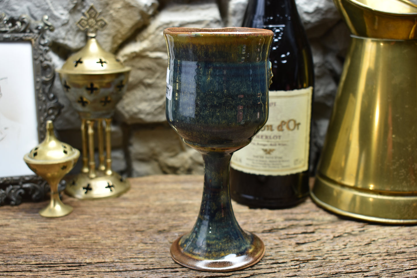 Handmade ceramic wine goblet with deathmoth - blue/brown effect glaze