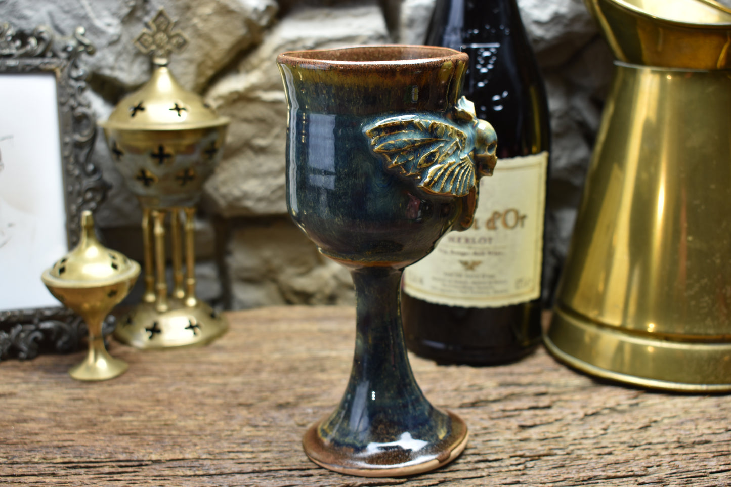 Handmade ceramic wine goblet with deathmoth - blue/brown effect glaze
