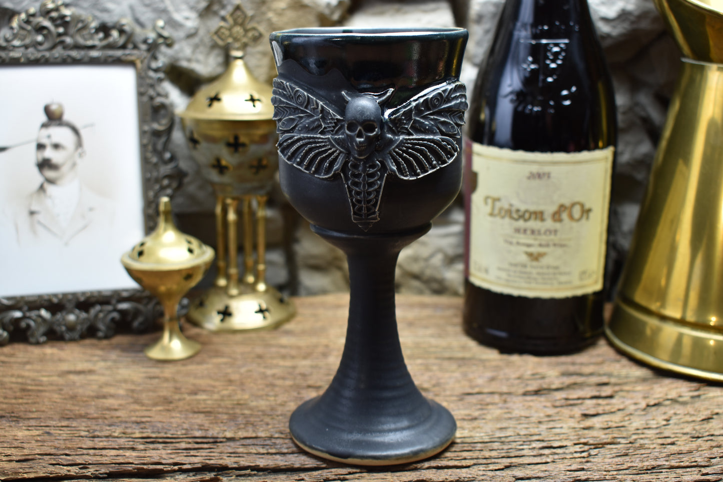 Handmade ceramic wine goblet with deathmoth - black matt & shiny effect glaze