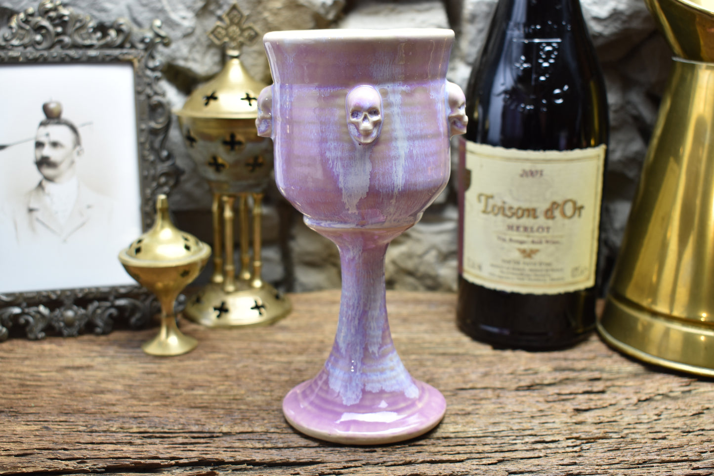 Handmade ceramic wine goblet with skulls - lilac effect glaze