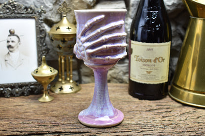 Handmade ceramic wine goblet with skeleton hand - lilac effect glaze