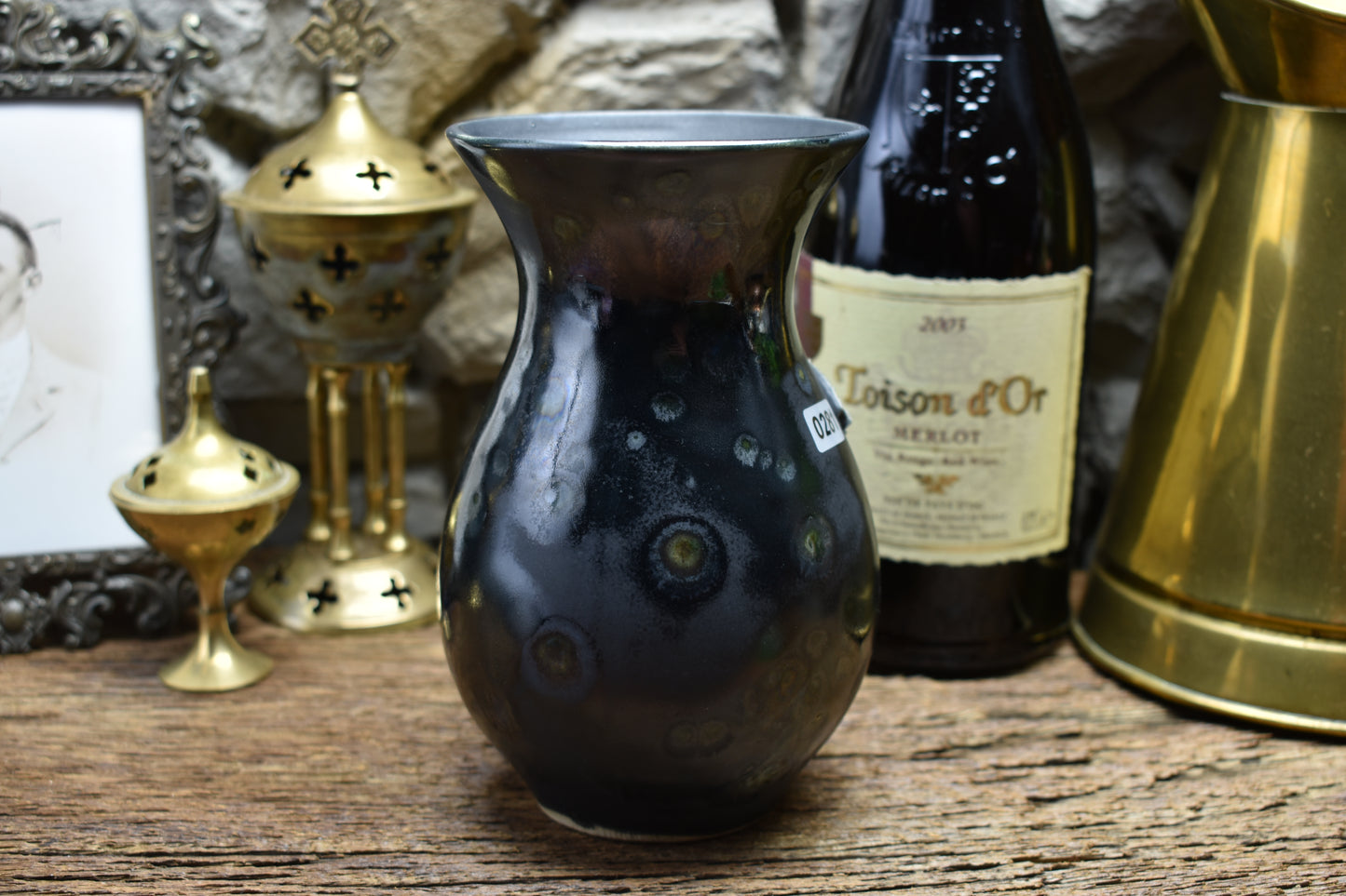 Handmade small vase with deathmoth - black shiny effect glaze