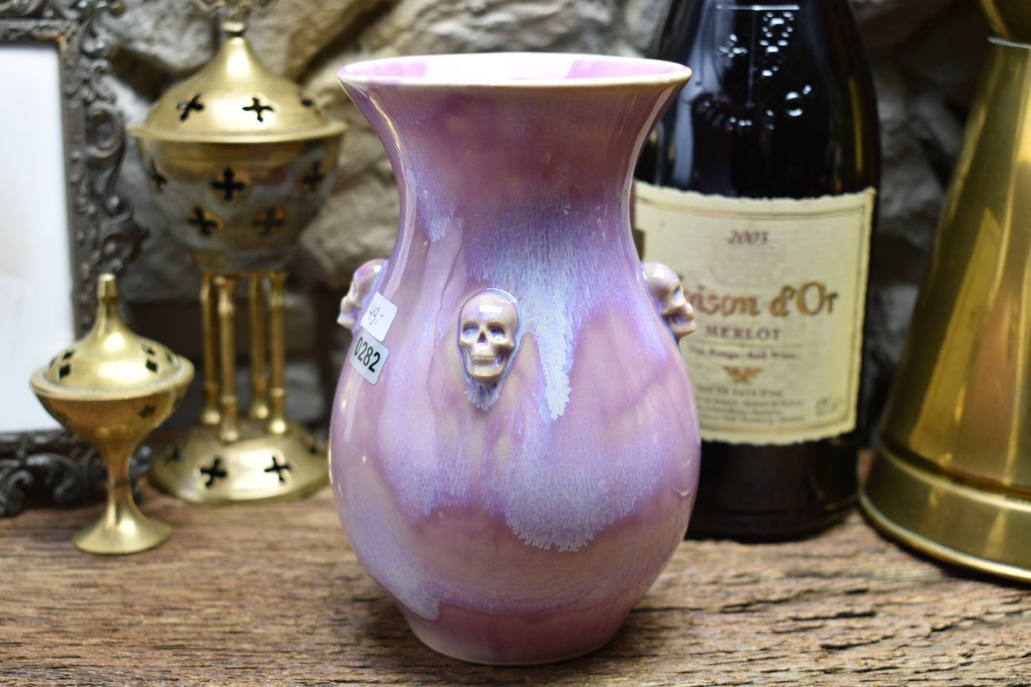 Handmade small vase with skulls lilac effect glaze