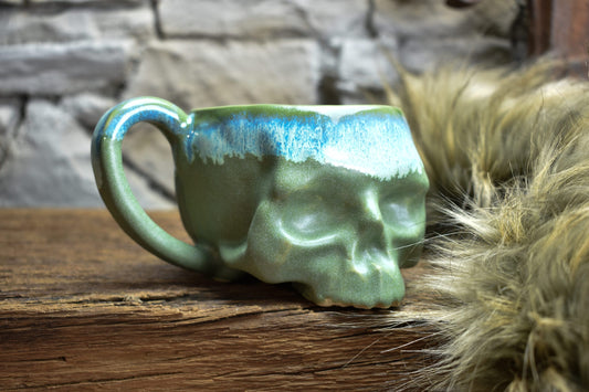 Skull mug green matt and blue effect glaze