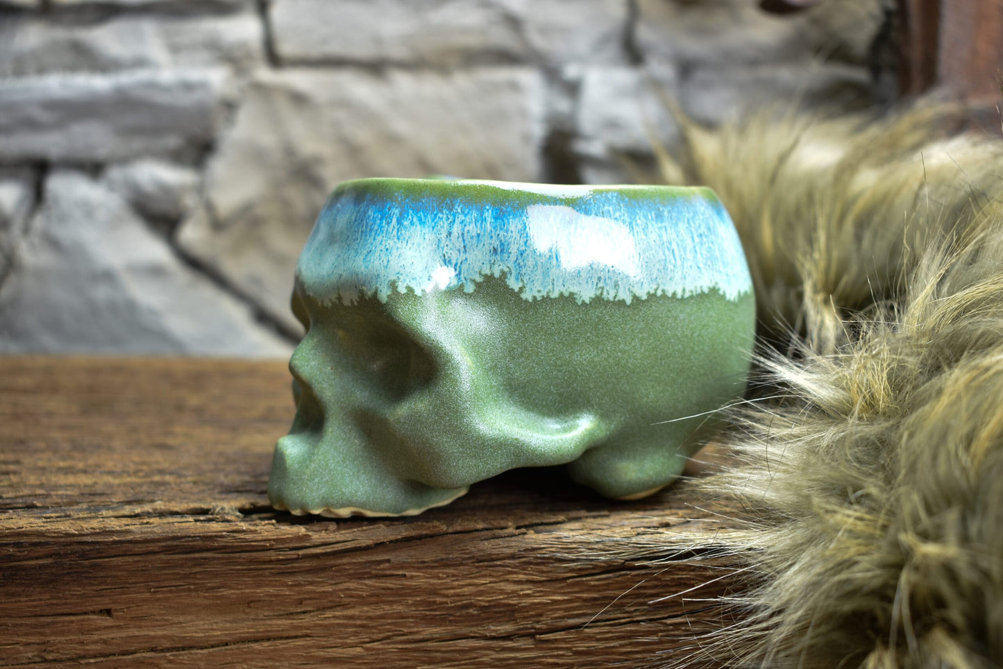 Skull mug green matt and blue effect glaze