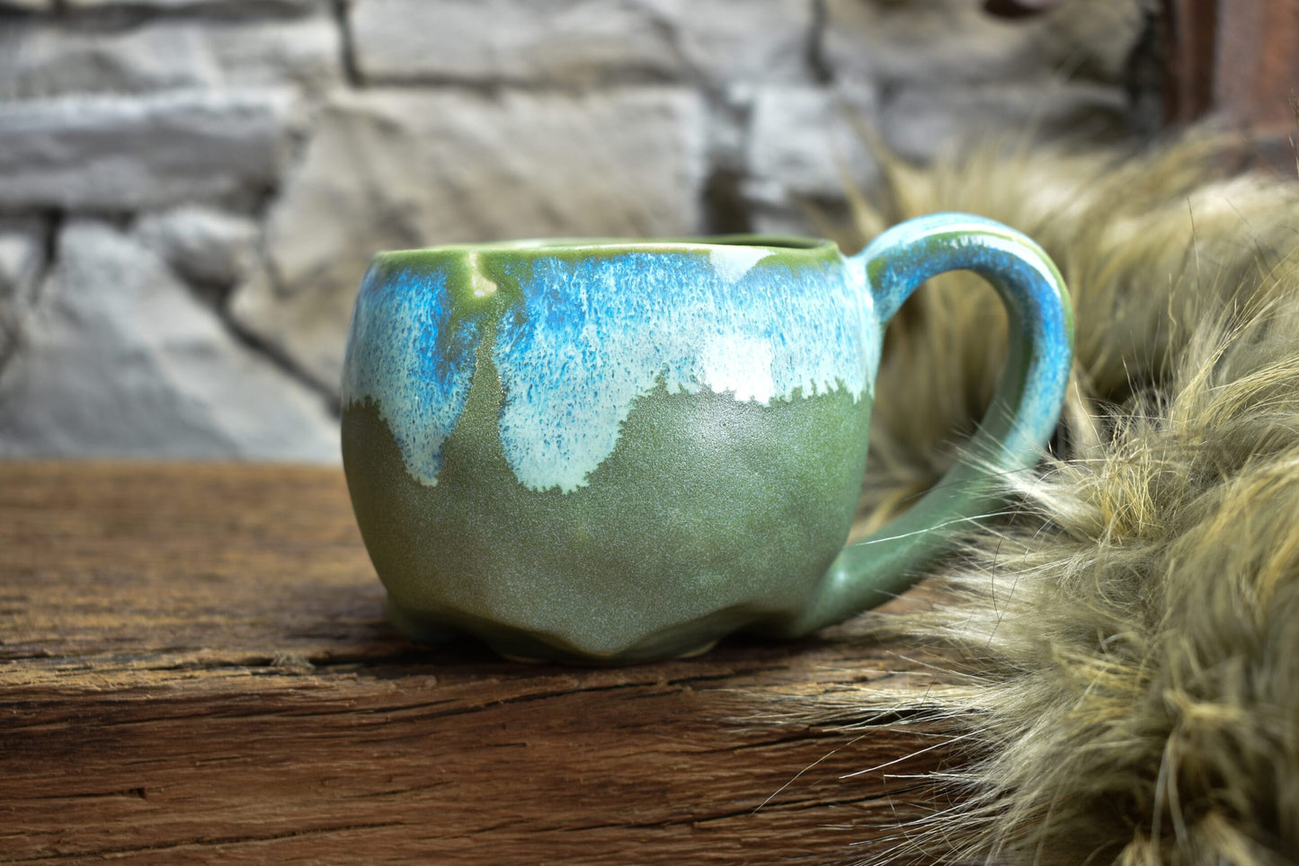 Skull mug green matt and blue effect glaze