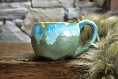 Skull mug green matt and blue effect glaze