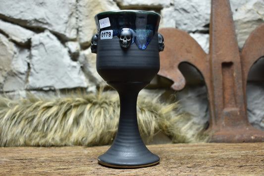 Handmade ceramic wine goblet with skulls - black matt and effect glaze