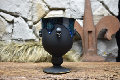 Handmade ceramic grail with skulls - black effect glaze