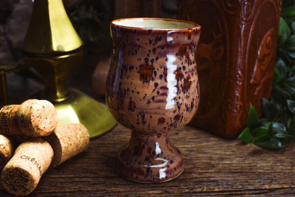 Handmade ceramic goblet with shiny bordeaux and black effect glaze