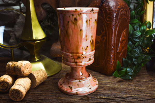 Handmade ceramic chalice with shiny pink effect glaze