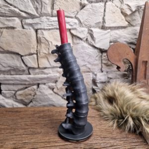 Handmade ceramic spine candle holder matt black