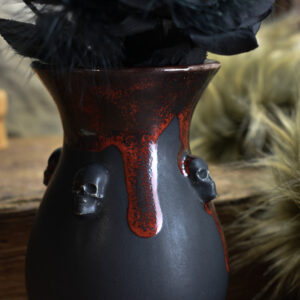 Handmade small vase with skulls black matt and red effect