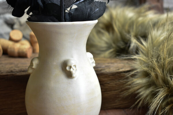 Handmade small vase with skulls white matt
