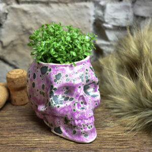 Small skull plantpot pink and green effect glaze