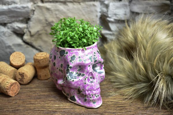 Small skull plantpot pink and green effect glaze