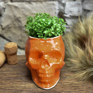 Small skull plantpot shiny orange