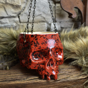 Medium size hanging skull plantpot red with black dots