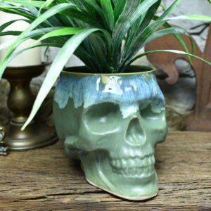 Big skull plantpot green matt and effect glaze